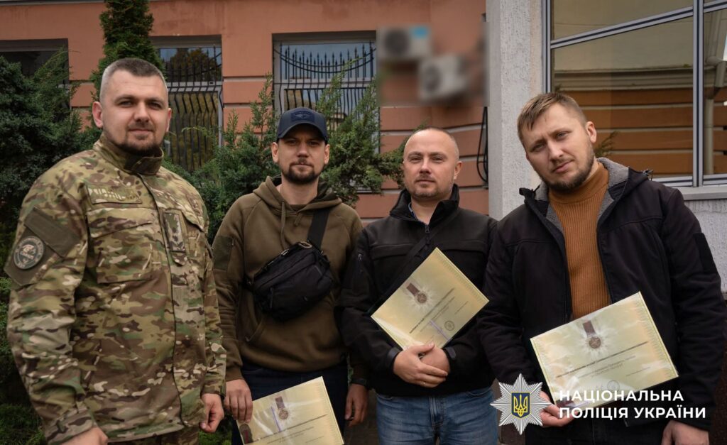з колегами та нагородою